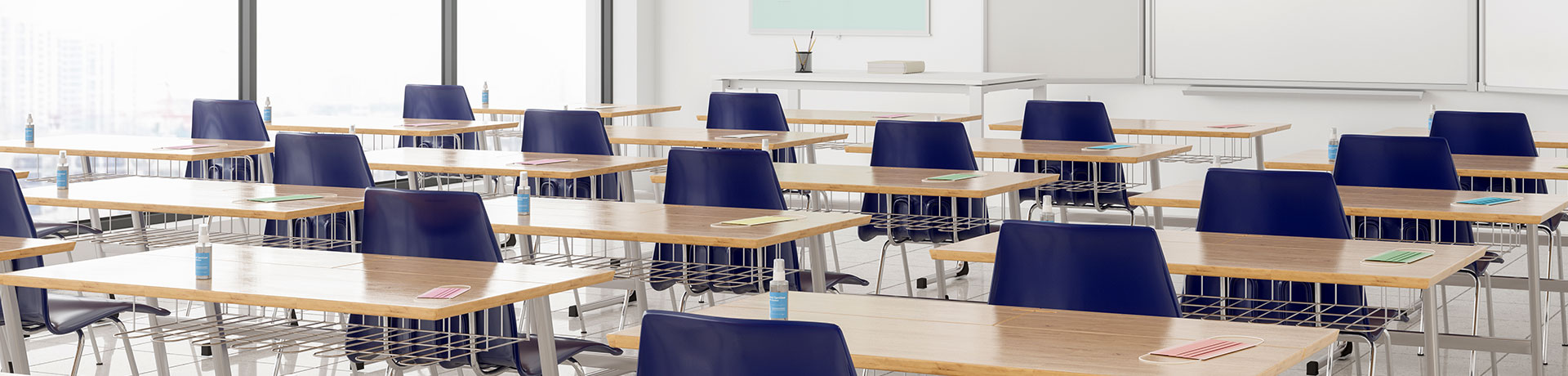 A classroom with tidied and cleaned wooden desks
