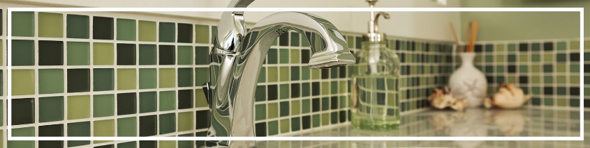 sink in front of tile backsplash